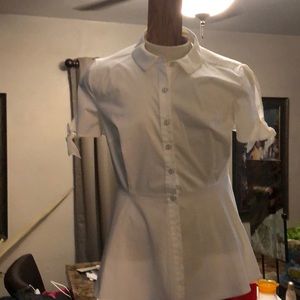 Ladies white buttoned down flouncy blouse